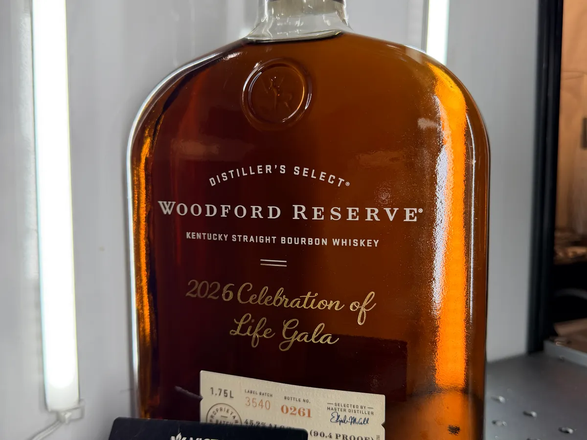 Woodford Reserve bourbon bottle laser engraved for a 2026 Celebration of Life gala event