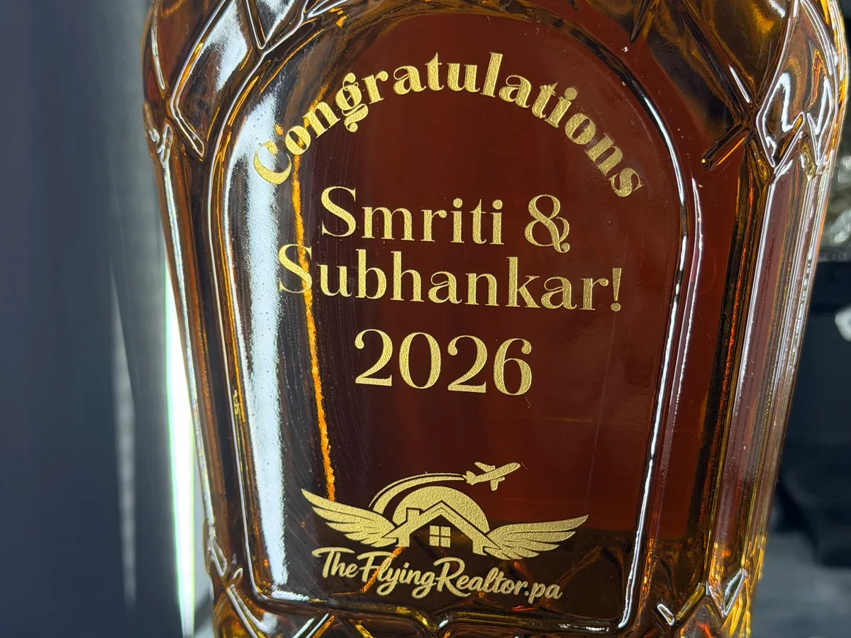 Whiskey bottle with gold laser engraving for a real estate closing gift by Victory Laser Engraving Delaware
