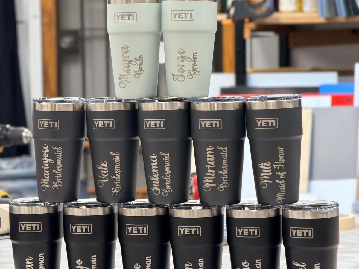 Personalized YETI tumblers laser engraved with names and wedding party roles by Victory Laser Engraving Wilmington Delaware