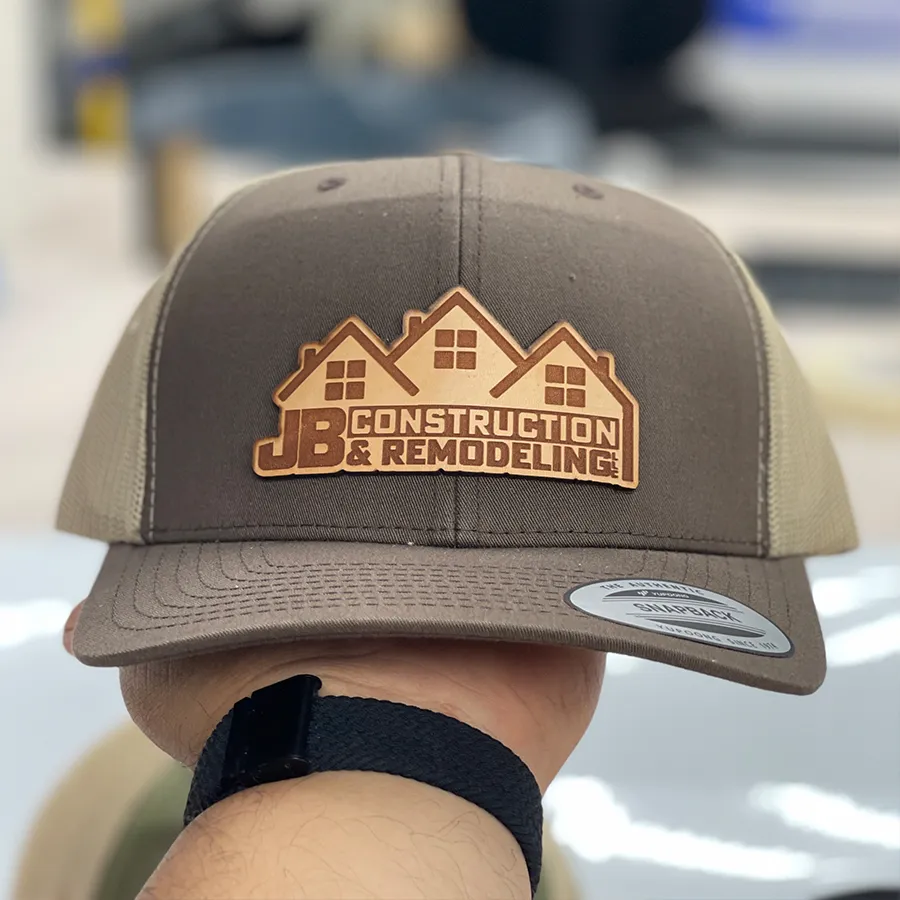 Laser engraved custom leather patch hats by Victory Laser Engraving